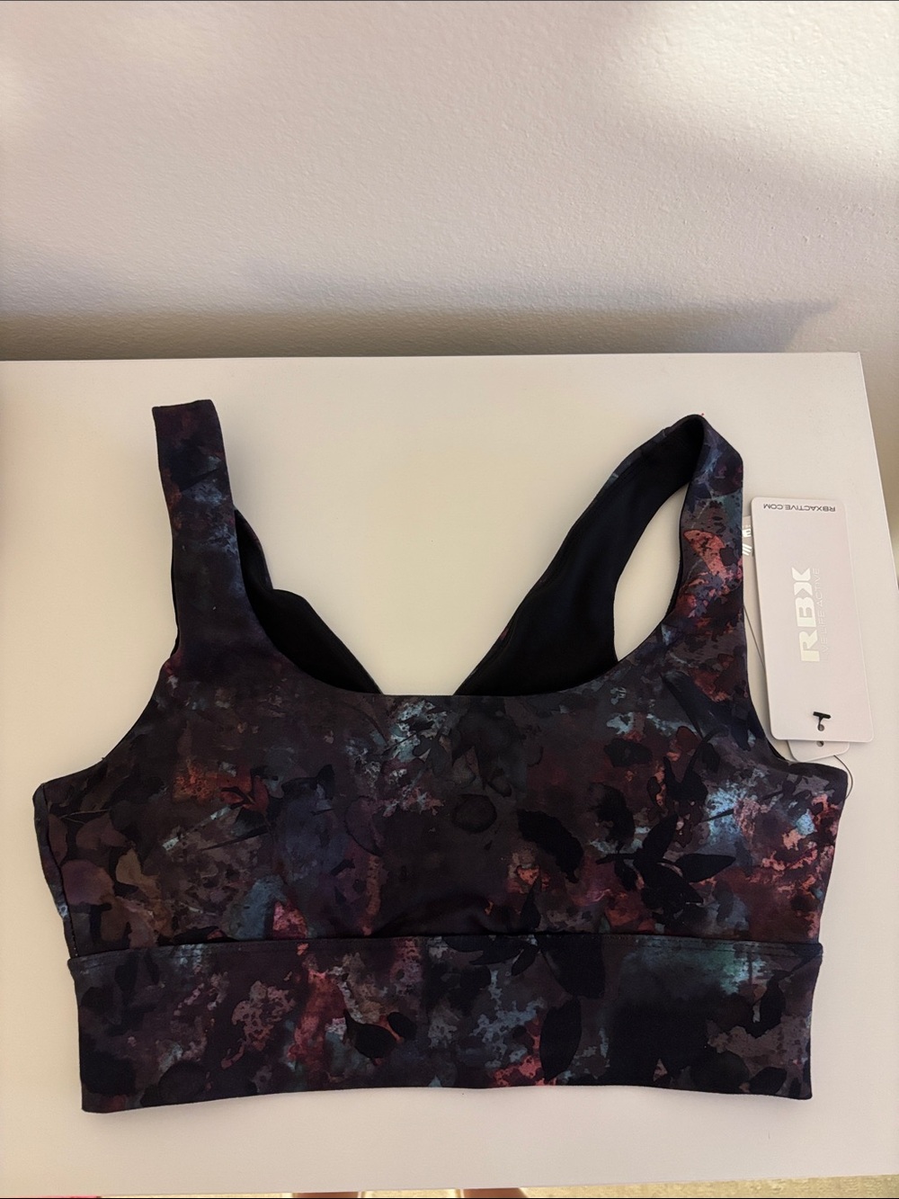 RBX Women's Dark Floral Print Sports Bra in Black with Red & Blue Accents
